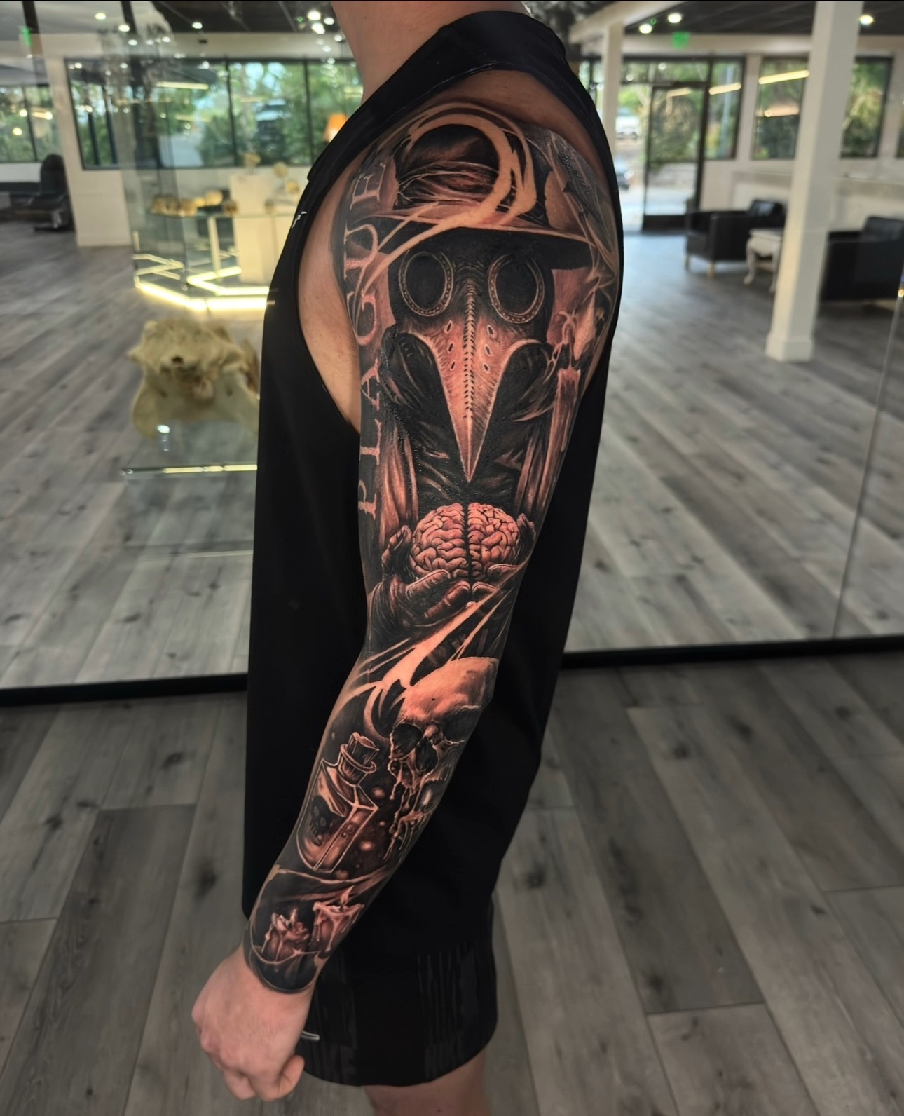 Black and grey plague doctor and skull full sleeve